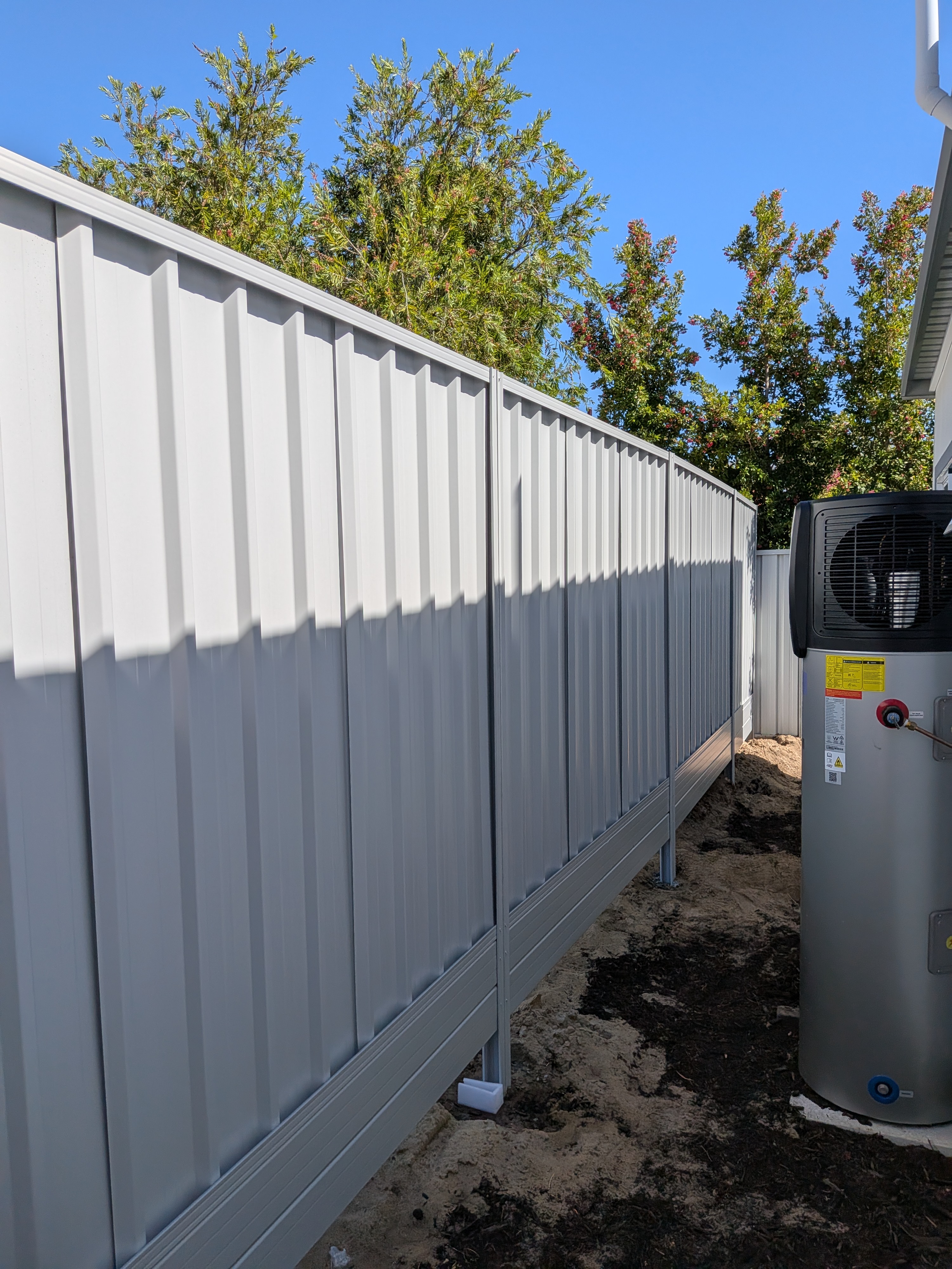 Completed Shale Grey Colorbond fence installation in Dianella